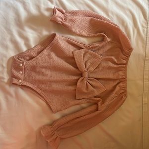 Pink one piece with big bow